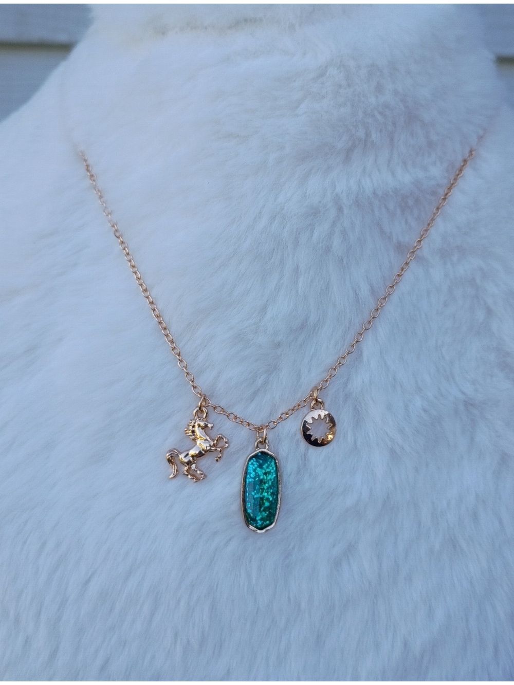 2/$10 December Girl Gold-Tone Necklace with Teal Glitter Pendant and Horse Charm - Picture 2 of 8
